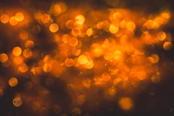 Gardinen Bokeh from blurred orange flame background © pandaclub23