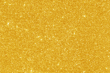 Golden yellow glitter bokeh background. Photo can be used for New Year, Christmas and all celebration concepts.	