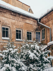 Old house in Vilnius Old Town in winter. Courtyard