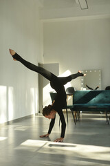 person doing yoga. ballet dancers in ballroom. woman doing yoga exercise