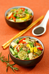 Vegetables wok with rosemary.