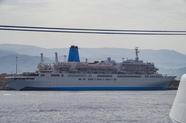 Classic cruiseship cruise ship liner Celebration docked at pier in Messina Sicily port, Italy...