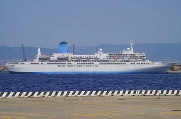 Classic cruiseship cruise ship liner Celebration docked at pier in Messina Sicily port, Italy...