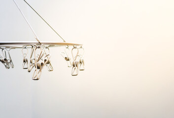 Shiny Stainless Steel Clip background white.