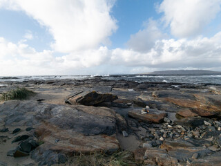 The rocks of Carrickfad by Portnoo at Narin Strand in County Donegal Ireland