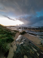 Dramatic clouds above Narin Strand, a beautiful large blue flag beach in Portnoo, County Donegal -...