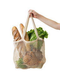Fototapeta premium Hand holding a mesh bag with fresh produce