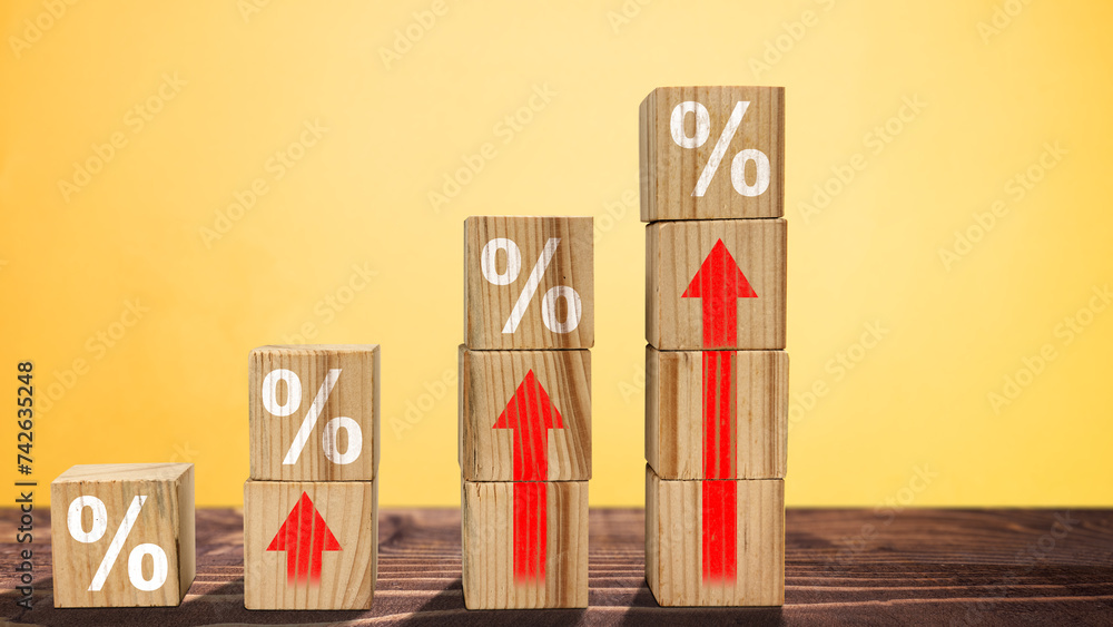 Poster stack of wooden cubes with the symbol of rising inflation rate graph arrow