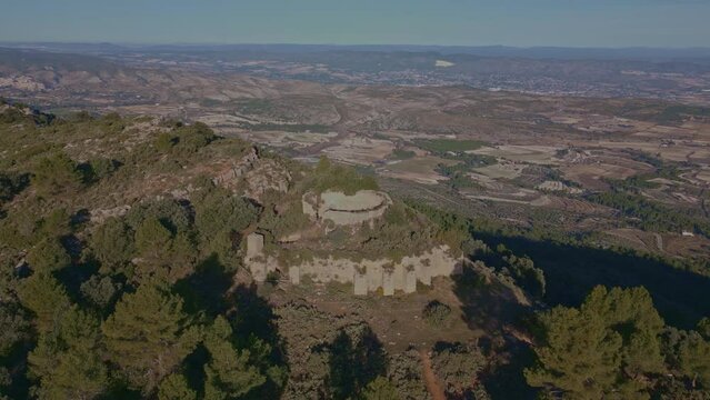 Aerial view looking at a nevera (snow pit) these snow pits were used in antiquity to preserve the fallen snow, Cava Don Miguel, Mariola mountain, Alicante, Spain - stock video