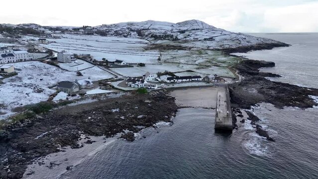 Aerial view ofa snow covered Portnoo harbour in County Donegal, Ireland.