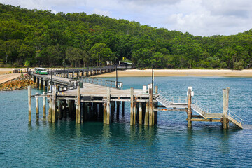 Wooden jetty of Kingfisher Bay on the west coast of Fraser Island (K'gari), where the ferry from Rivers Head travels to the continental Queensland, Australia