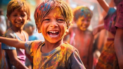 Fototapeta premium Happy people celebrating holi. the child laughs and throws paint and multi-colored powder. holy holiday in india