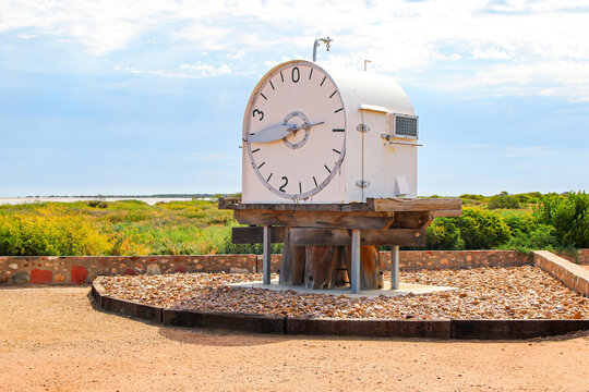 Mechanical tide clock at the start of Port Germein jetty in South Australia