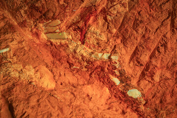 Opal gemstone inlaid in a gallery of the Old Timers Mine in Coober Pedy, South Australia