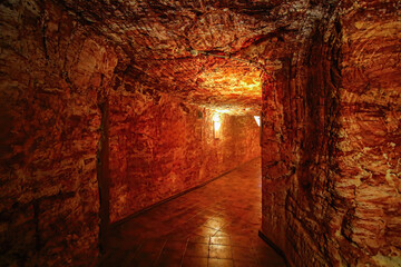 Underground corridor in the Desert Cave Hotel in Coober Pedy, (South Australia), dug out of...