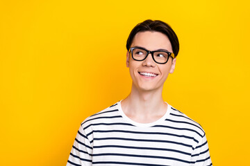 Portrait of nice student with brunet hair wear stylish t-shirt in eyewear look at offer empty space...