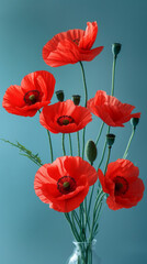 Bouquet of red poppies on a green background. - 742655426