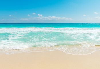 Fototapeta na wymiar Turquoise water and golden sand in a tropical beach