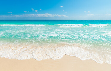 Sun shining over a tropical beach with turquoise water - 742664499