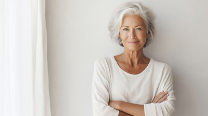 Elderly smiling woman on white background
