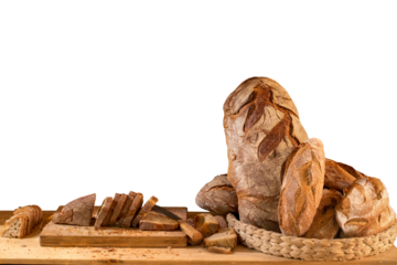 Basket of artisan breads and slices isolated on transparent