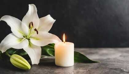 Obraz na płótnie Canvas beautiful lily and burning candle on dark background with space for text funeral white flowers