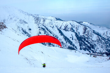 preparation for paragliding over the mountains