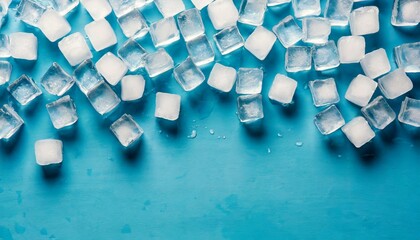 Ice cubes background. Frozen water blocks. Blue tones. Flat lay