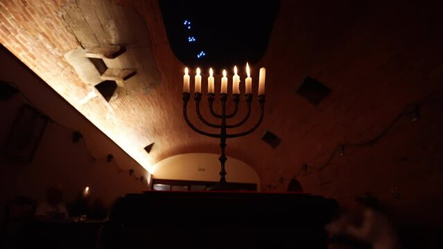Mystery lodge of freemason community with menorah candlestick in the centre and religious symbols, temple of freemasonry lodge, world domination using religious theory