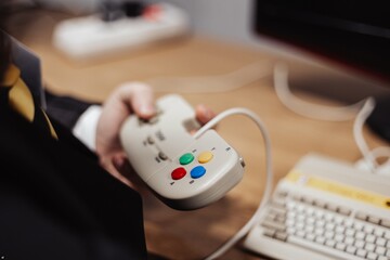 person playing a vintage console