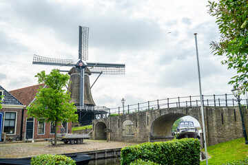 Traditional Dutch windmill in the village of Woudsend, Netherlands
