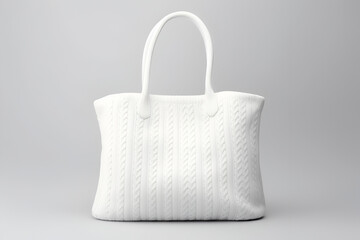 Mockup of fashionable white knitted winter bag on gray background. Space for design, print and showcasing. Generate Ai