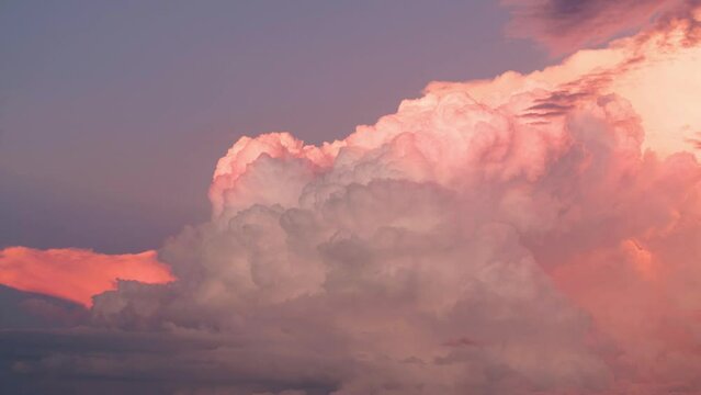 A time lapse video containing 375 images, showing the development of a cumulonimbus cloud over the Free State province of South Africa. Shot at sunset, the sunlight can be seen fading off the cloud.