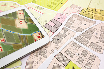 Buildings Permit concept with imaginary cadastral on digital tablet - building activity and...