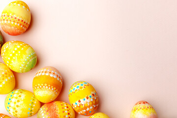 Easter background. Handmade painted eggs lie on a pink background. - 742750860