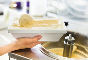 Thermal insulation tray with ice cream preparation process at factory