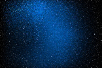 Black dark blue white shiny glitter abstract background with space. Twinkling glow stars effect....