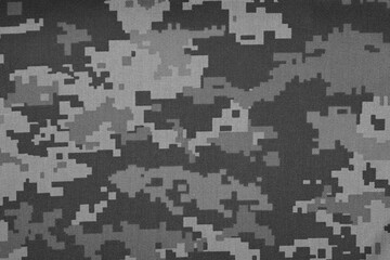 Texture of camouflage fabric as background, top view. Black and white effect