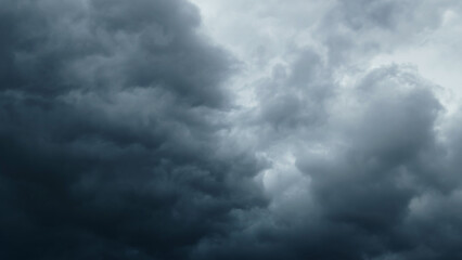 storm sky, dark dramatic clouds during thunderstorm, rain and wind, extreme weather, abstract...
