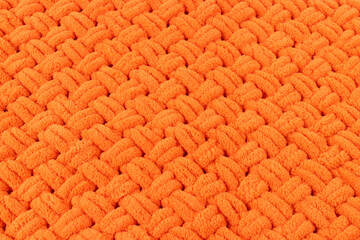 Loop yarn, orange soft and fluffy knitted texture, background