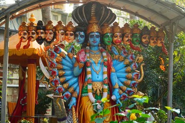 god vishnu statue with multiple heads