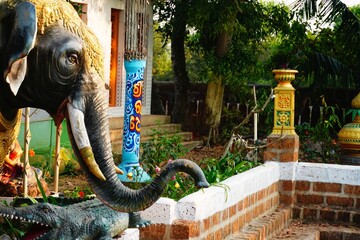 figurine of black elephant in temple