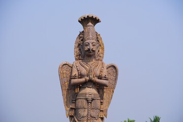 Fototapeta na wymiar a rock statue of guruda deva