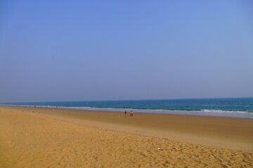 people walking on beach 19 feb 2024 , Golden Beach, Puri, Odisha