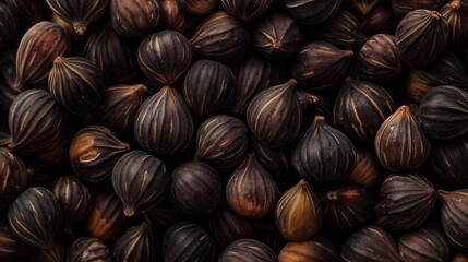 fig seeds displayed in detail, showcasing their unique shape and diminutive size.  - obrazy, fototapety, plakaty
