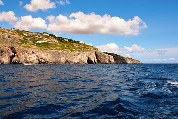 Fototapeta na wymiar The caves on the Adriatic side of Santa Maria di Leuca seen from the tourist boat