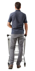 Back view of a young man pushing an empty shopping cart.