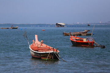 Coastal fishing boats in the sea of fishing village villagers.