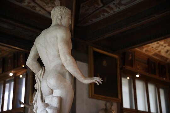 Florence, Italy - February 8, 2024: Doryphoros statue at Uffizi gallery, low angle view. Space for text