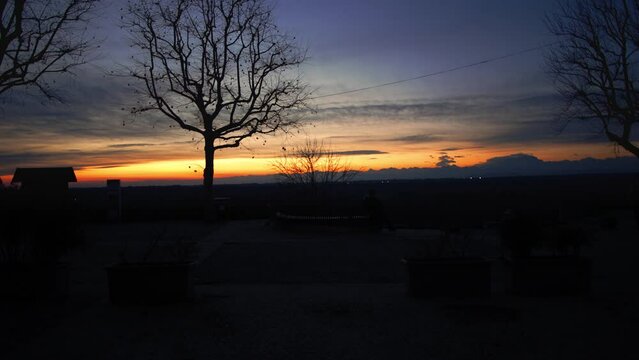 Winter sunset on the square of Tornavento, Italy